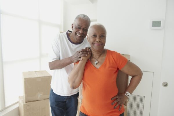 Old couple holding hands